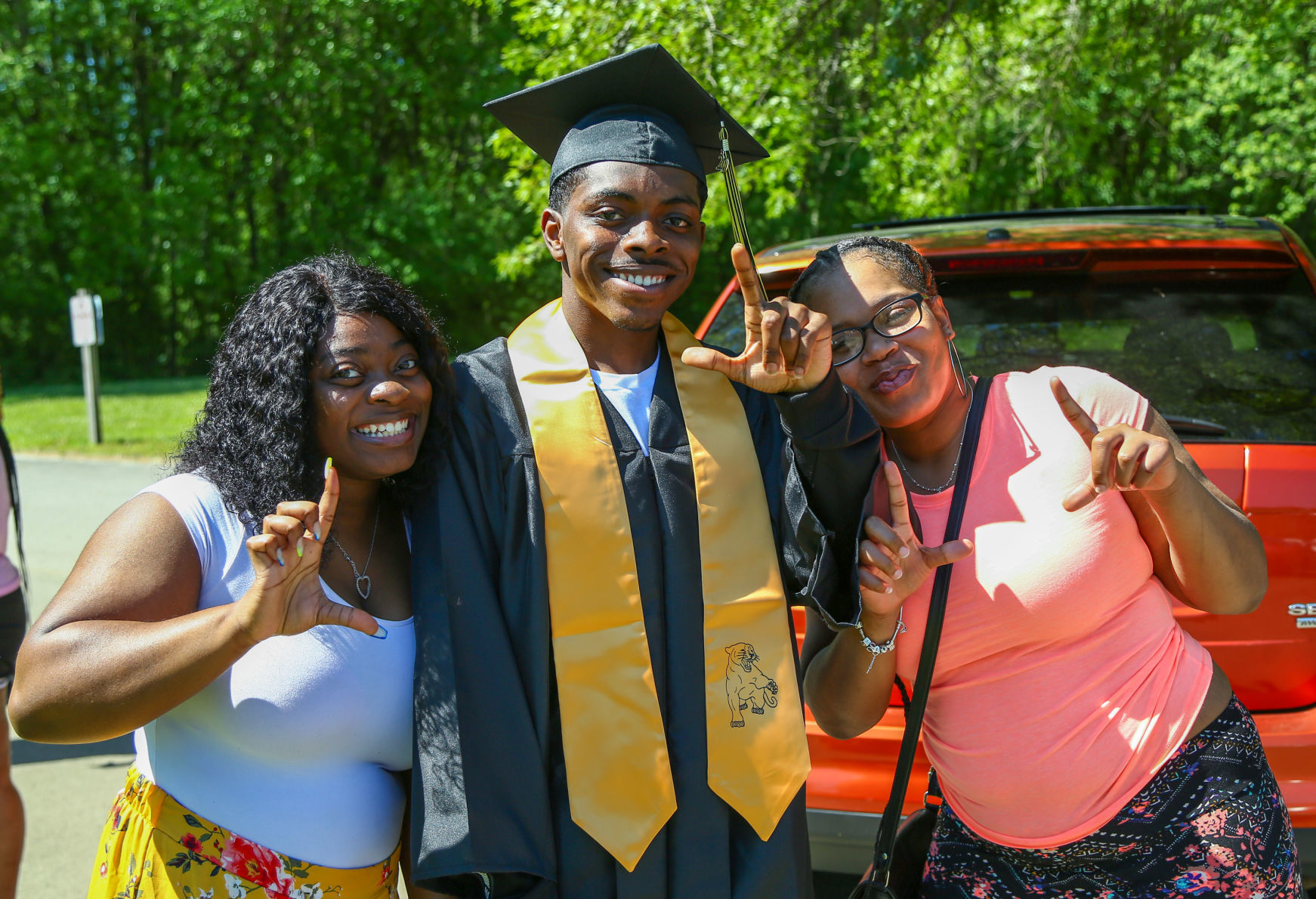 The last graduating class from Roosevelt College and Career Academy graduates